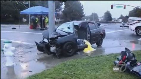 Alameda road closed after car crashes into light pole